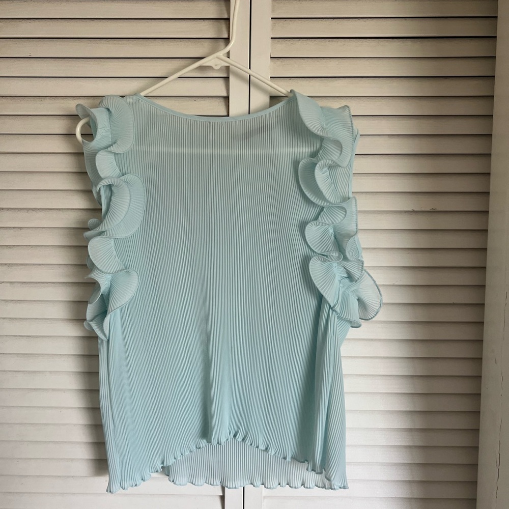 Blue blouse with ruffles